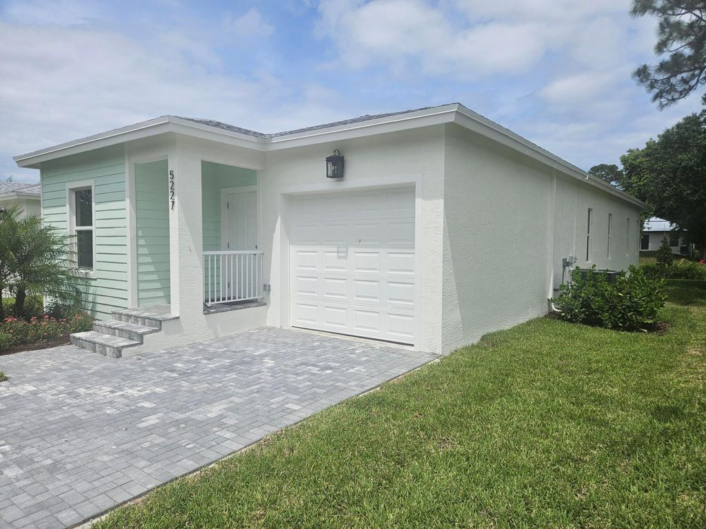 Photo of 5227 SE Isabelita Avenue, Stuart, FL 34997 (MLS # R11084756)