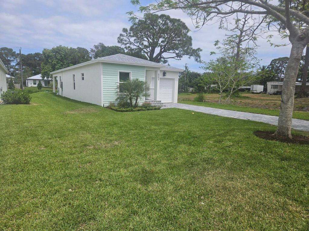 Photo of 5227 SE Isabelita Avenue, Stuart, FL 34997 (MLS # R11084756)