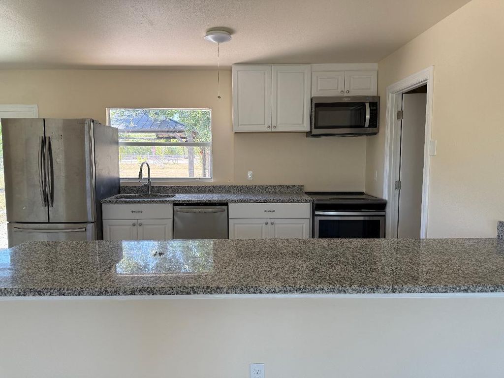 Photo of 2142 SE East Dunbrooke Circle, Port Saint Lucie, FL 34984 (MLS # R11159612)