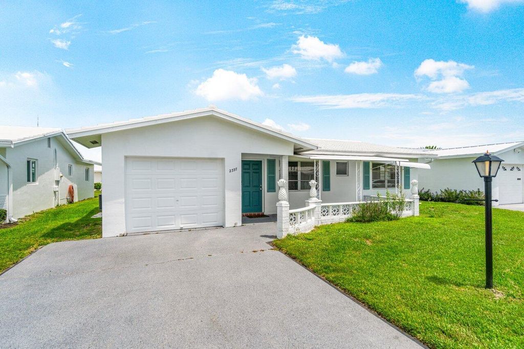 Photo of 2397 SW 11th Avenue, Boynton Beach, FL 33426 (MLS # R11013450)