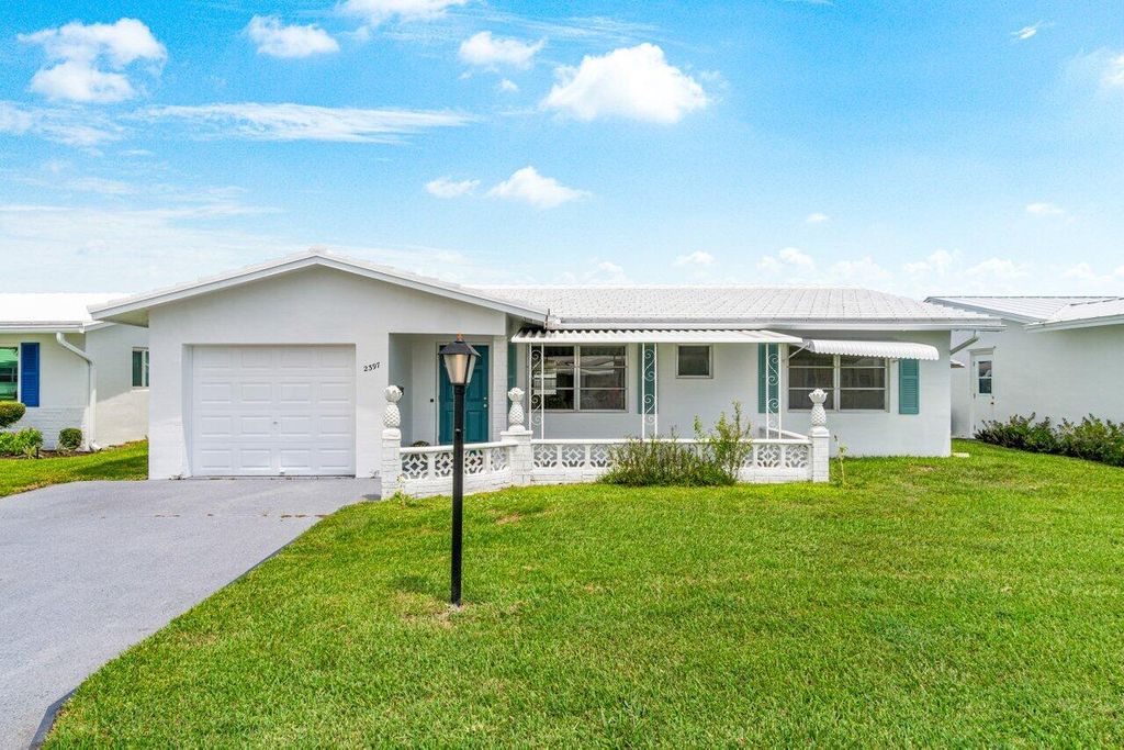 Photo of 2397 SW 11th Avenue, Boynton Beach, FL 33426 (MLS # R11013450)