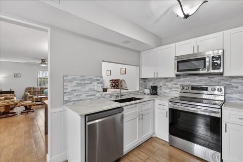 Tiny photo for 7633 Tahiti Lane #101, Lake Worth, FL 33467 (MLS # B26012430)