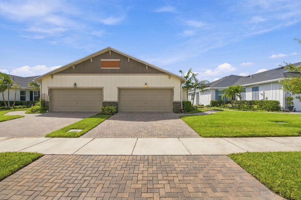 Photo of 1961 SE Crosswood Way, Port Saint Lucie, FL 34984 (MLS # B26087889)
