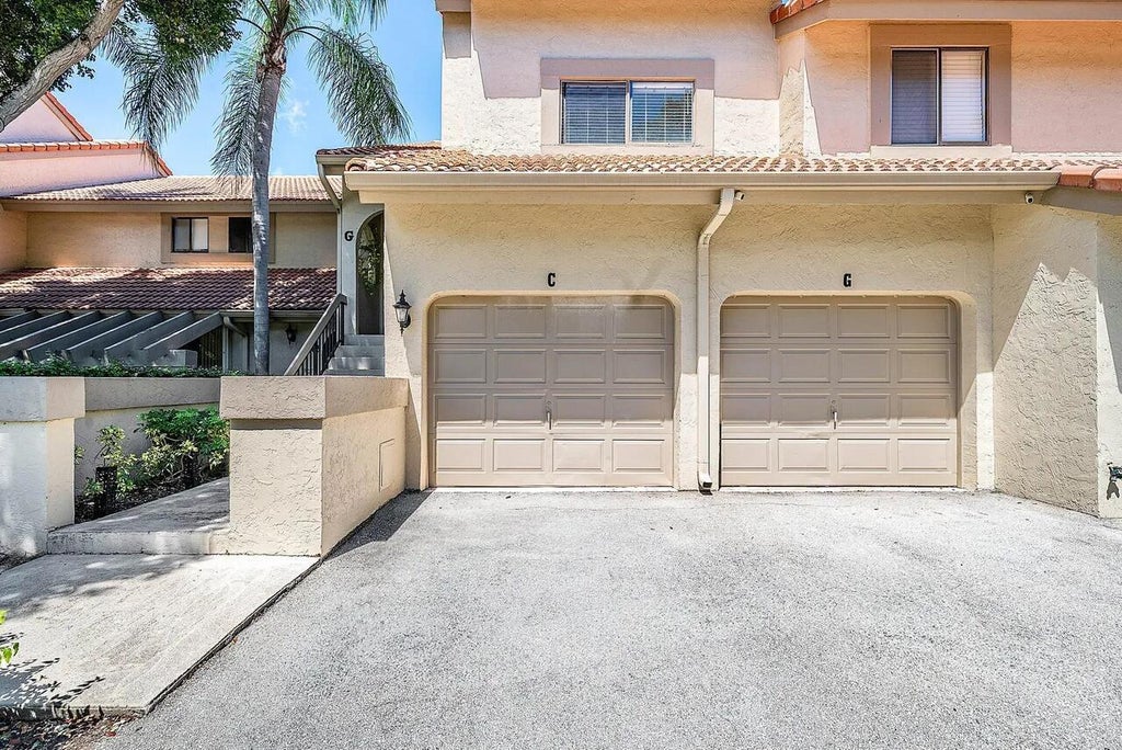 Photo of 5520 Coach House Circle #G, Boca Raton, FL 33486 (MLS # B26040676)
