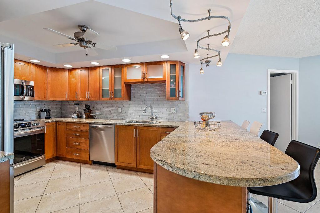 Photo of 2800 N Ocean Dr #A -22b, Singer Island, FL 33404 (MLS # R10871534)