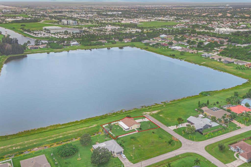 Photo of 1999 SW Guernsey Street, Port Saint Lucie, FL 34987 (MLS # R10746662)