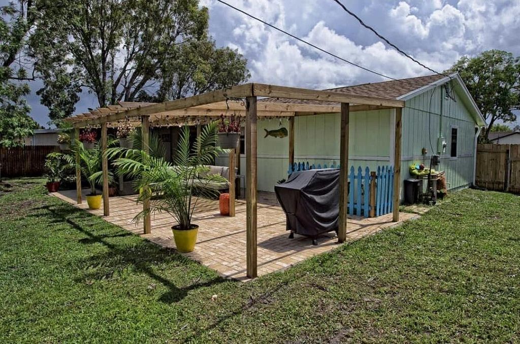 Photo of 879 SW Canary Terrace, Port Saint Lucie, FL 34953 (MLS # R10994850)