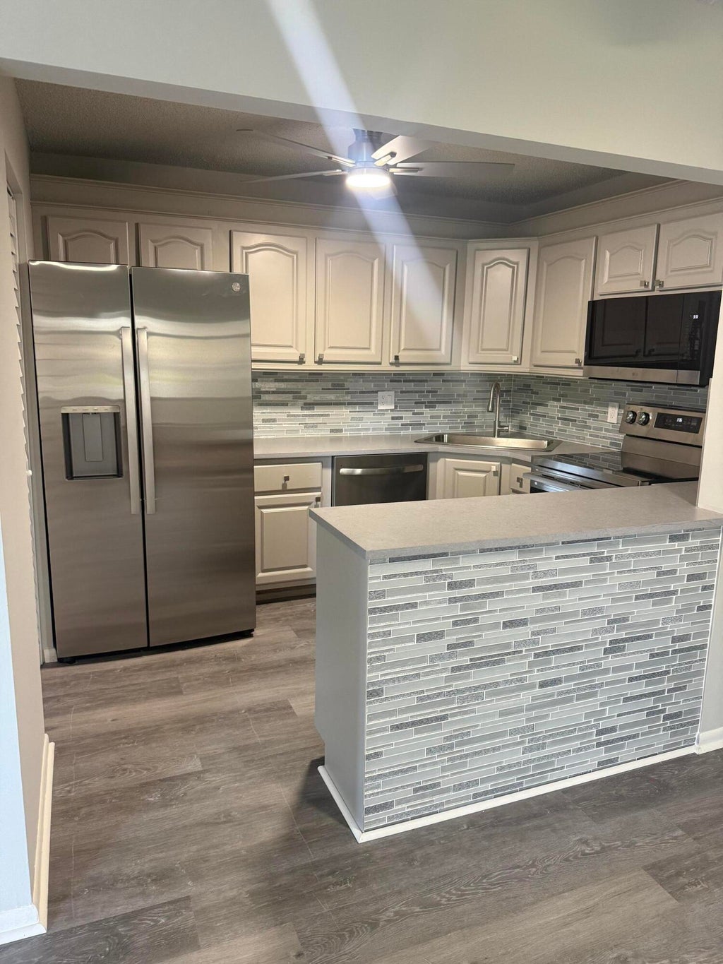 Photo of 302 Knotty Pine Circle #A-1, Greenacres, FL 33463 (MLS # B26080407)