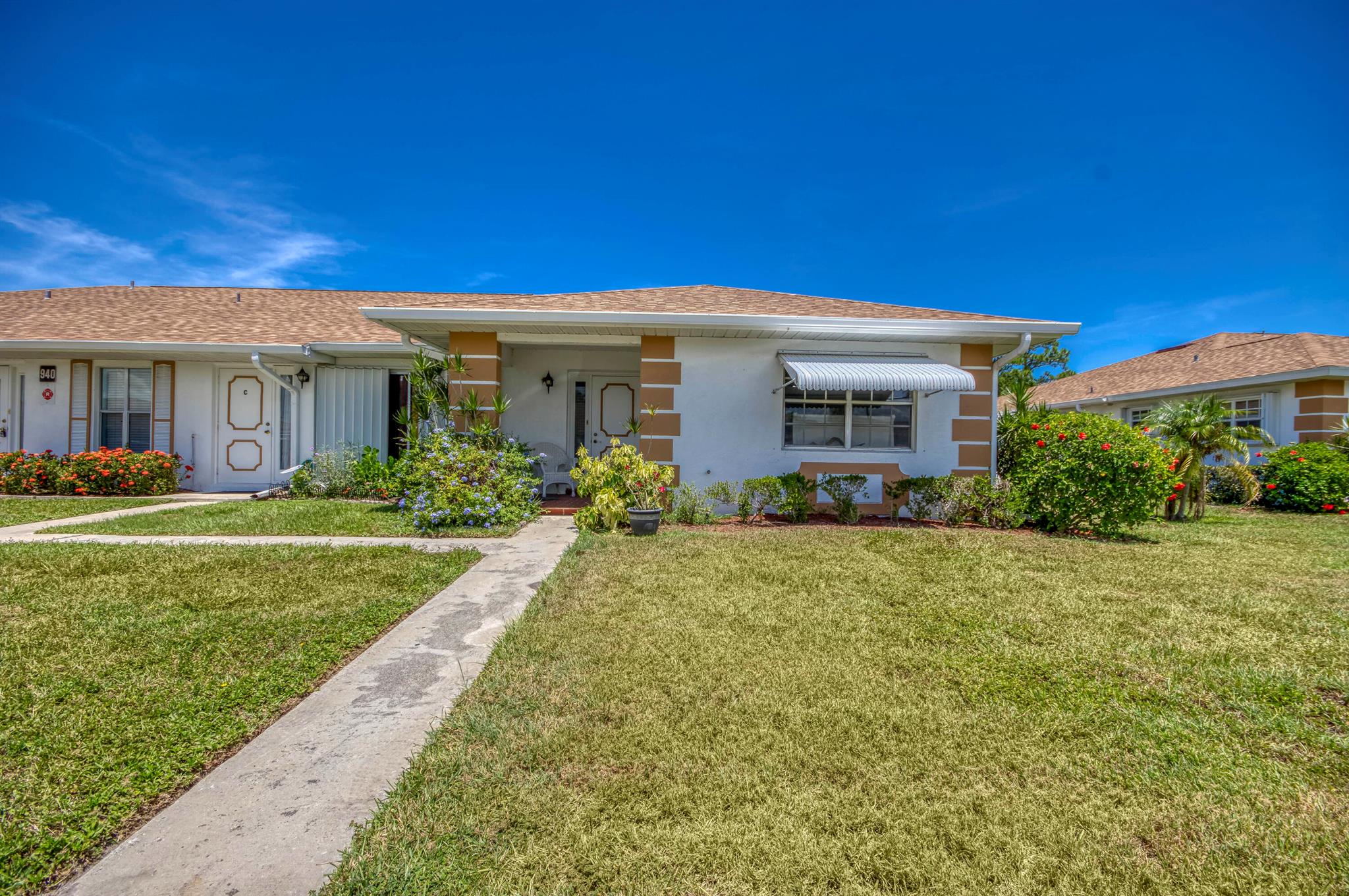 Great opportunity in this 2-bedroom, 2-bath home located in a desirable 55+ community. While the home does need some work, the motivated seller is ready for offers. Enjoy peaceful preserve views from the backyard, which is part of the community's shared green space. The thoughtful floor plan provides privacy with the primary suite tucked in the back and a guest bedroom at the front of the home. This end-unit residence is conveniently close to the clubhouse and pool, with each section of the neighborhood offering its own amenities. The living area opens to a sunroom (previously a screened patio, now enclosed), as well as an outdoor patio, creating flexible spaces for relaxing or entertaining. Don't miss the chance to make this home your own and enjoy the lifestyle in this active community!