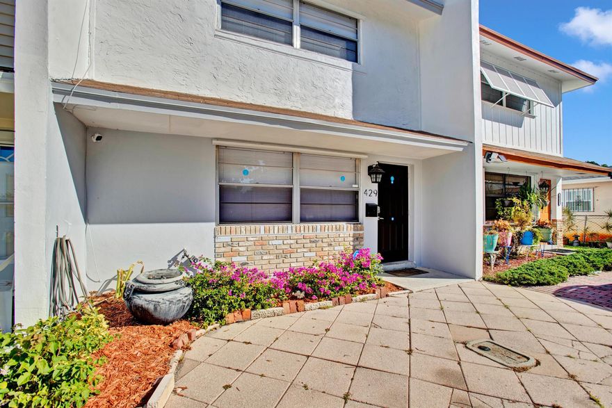 Welcome to this fully renovated 2-bedroom, 1.5-bathroom townhome, perfectly located in the heart of Lake Park. This home has undergone a complete transformation, boasting brand new laminate wood flooring, beautifully remodeled bathrooms, and a modern kitchen with quartz countertops and stainless steel appliances. The entire interior has been freshly painted, creating a bright and inviting space. Situated just half a mile from the stunning Singer Island, this home offers both luxury and convenience. Its central location between Downtown Gardens and Downtown West Palm Beach ensures easy access to premier shopping, dining, and the finest attractions Palm Beach has to offer.