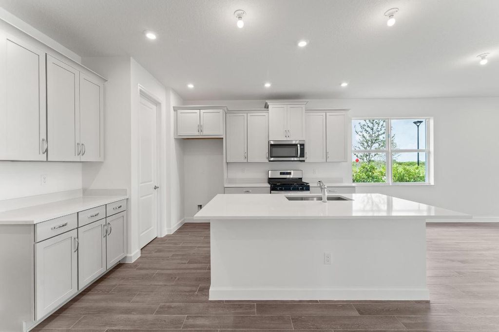Photo of 9690 SW Indra Way, Port Saint Lucie, FL 34987 (MLS # R11109588)