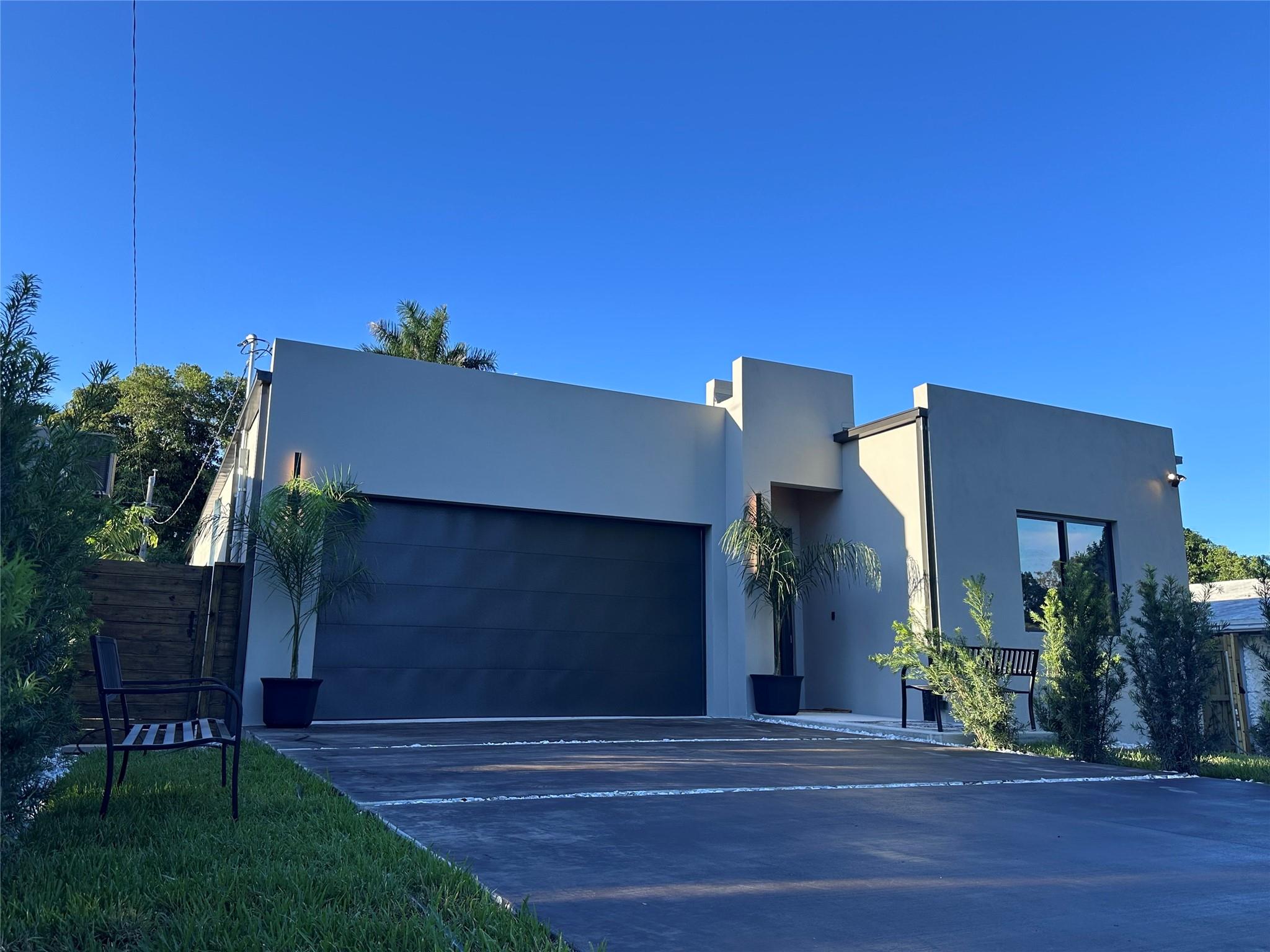 The House of Bellevue
A striking new residence in Miami Shores, El Portal, and Biscayne Park area. This modern home offers a spa-inspired primary suite, chef’s kitchen with premium appliances, open living and dining, and a laundry room designed for convenience. Enjoy a resort-style backyard with expansive patio, heated pool, sundeck, and jacuzzi jet bench. Additional features include a two-car garage with Level 2 EV charger, full smart-home integration for lights, security, AC, pool, and more, plus robust construction built to FEMA and High Velocity Hurricane Zone standards. Sleek, luxurious, and distinctly Miami. Beautifully Staged by Simple Dwell