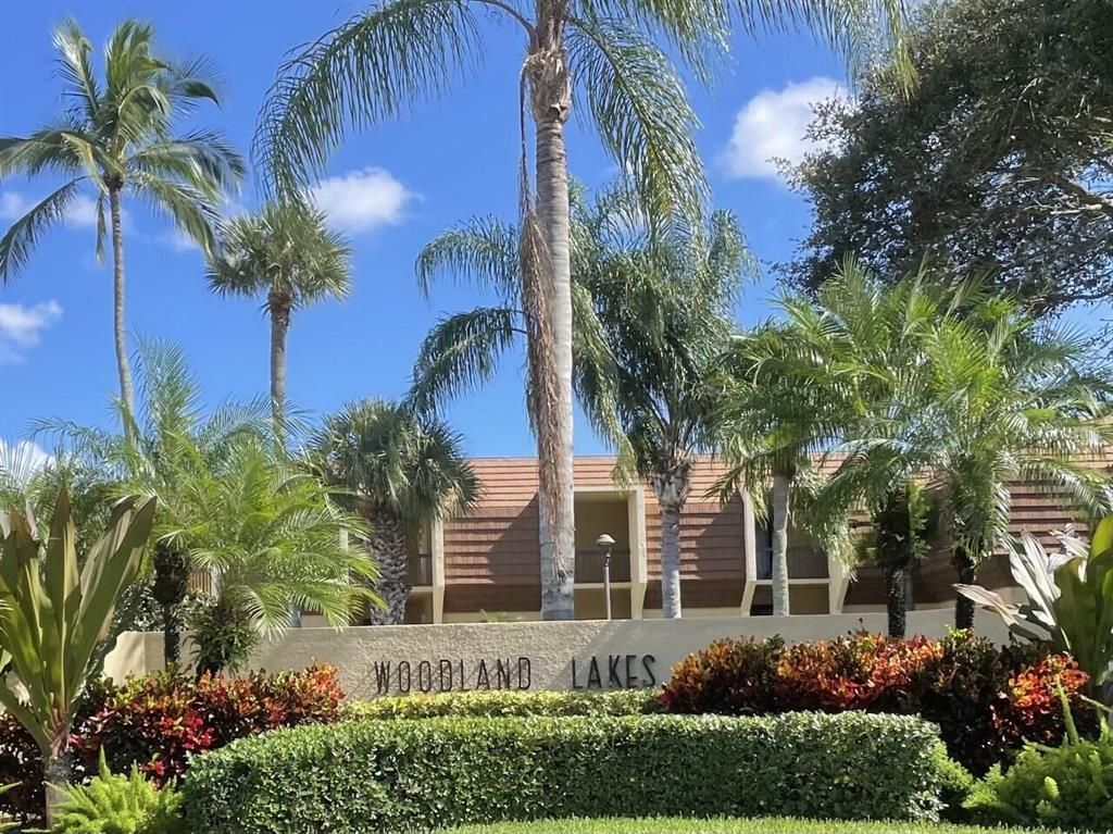 Photo of 5390 Woodland Lakes Drive #103, Palm Beach Gardens, FL 33418 (MLS # R10749375)