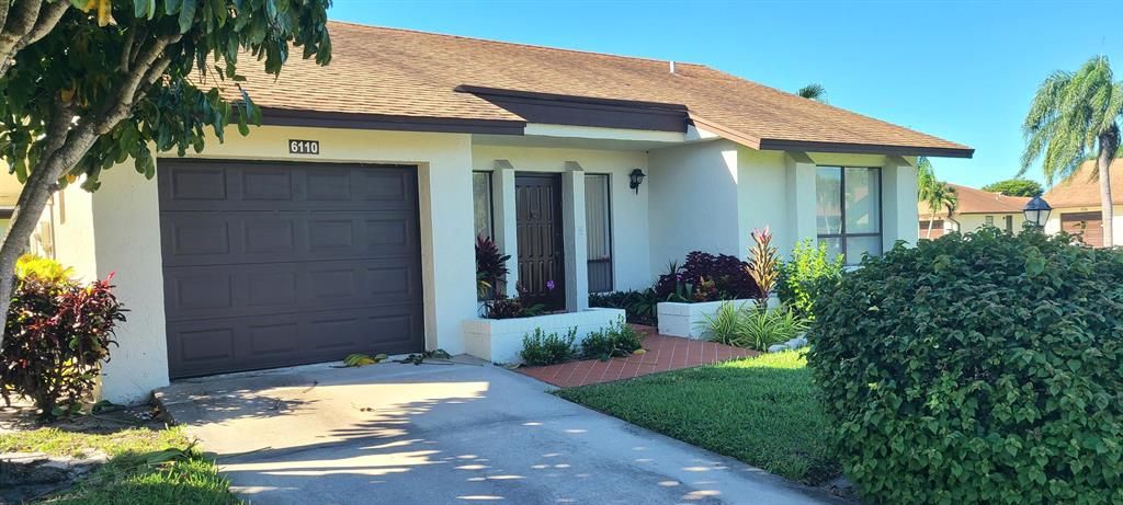 Photo of 6110 Ambertree Lane, Green Acres, FL 33463 (MLS # R10843399)
