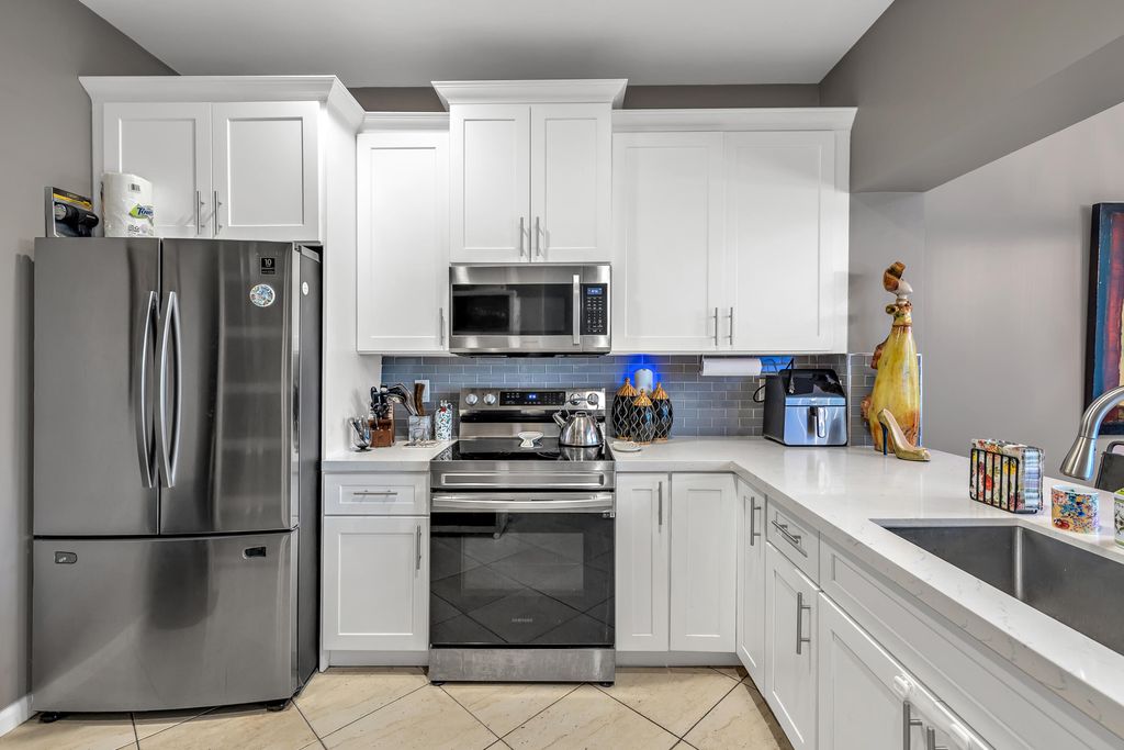 Photo of 6407 Bella Circle #403, Boynton Beach, FL 33437 (MLS # B26022312)