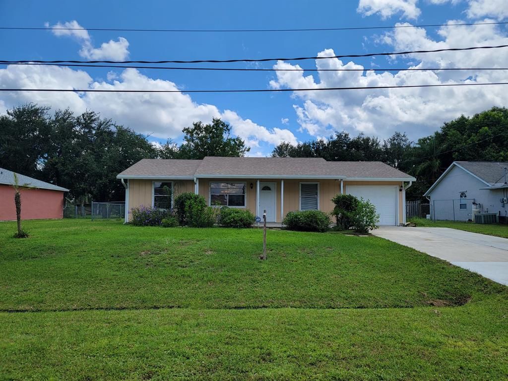 Photo of 850 SW Paul Revere Terrace, Port Saint Lucie, FL 34953 (MLS # R10747606)