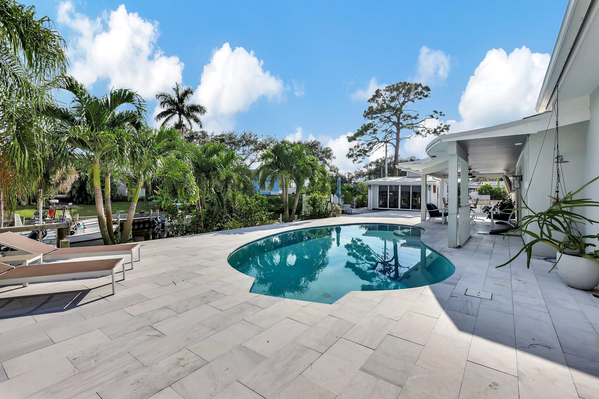 View photos, virtual tours, details... 3902 SE Coquina Drive