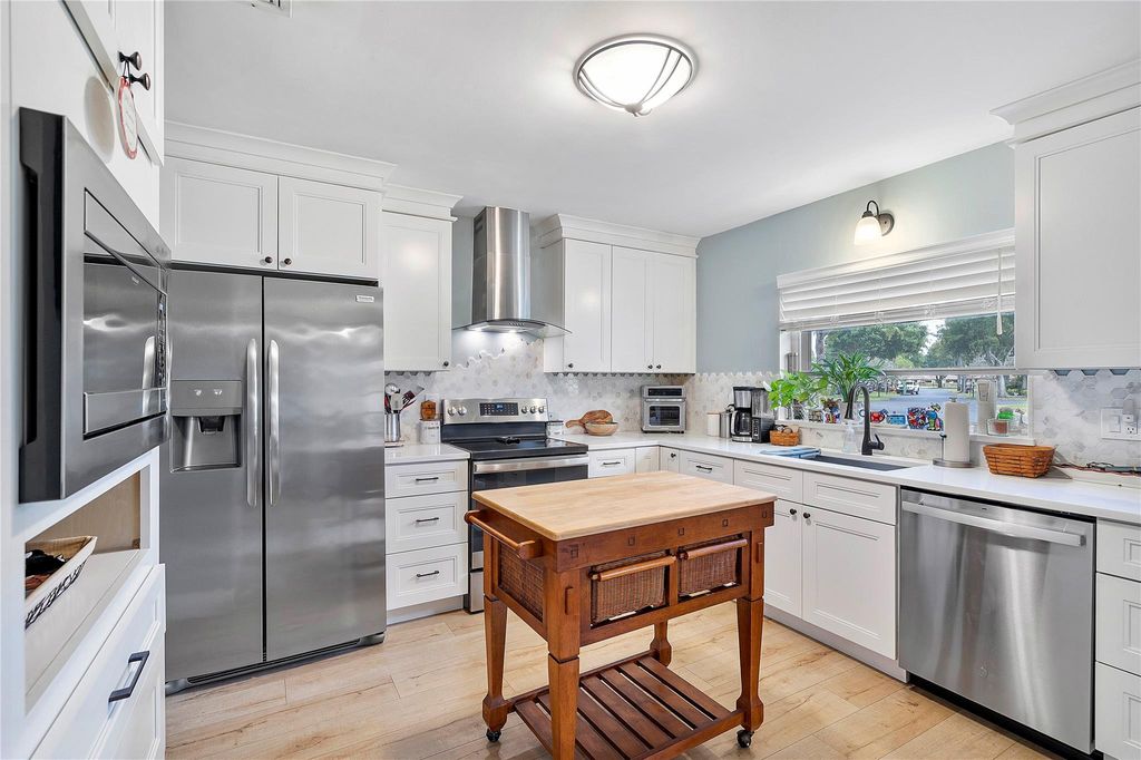 Photo of 4872 Hawkwood Road #B, Boynton Beach, FL 33436 (MLS # F10500291)