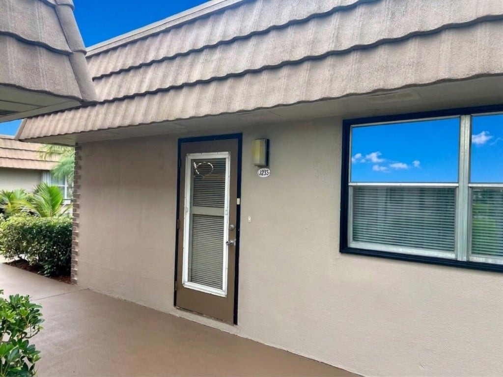 Photo of 233 SEVILLE J Boulevard, Delray Beach, FL 33484 (MLS # B26092447)