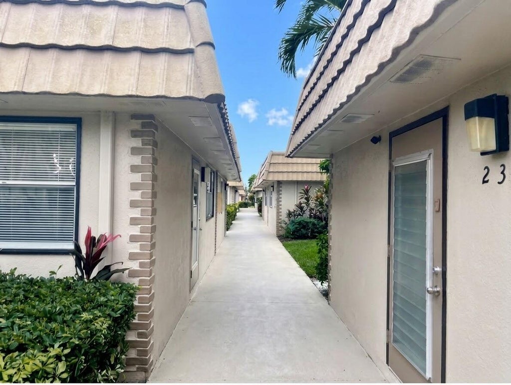 Photo of 233 SEVILLE J Boulevard, Delray Beach, FL 33484 (MLS # B26092447)