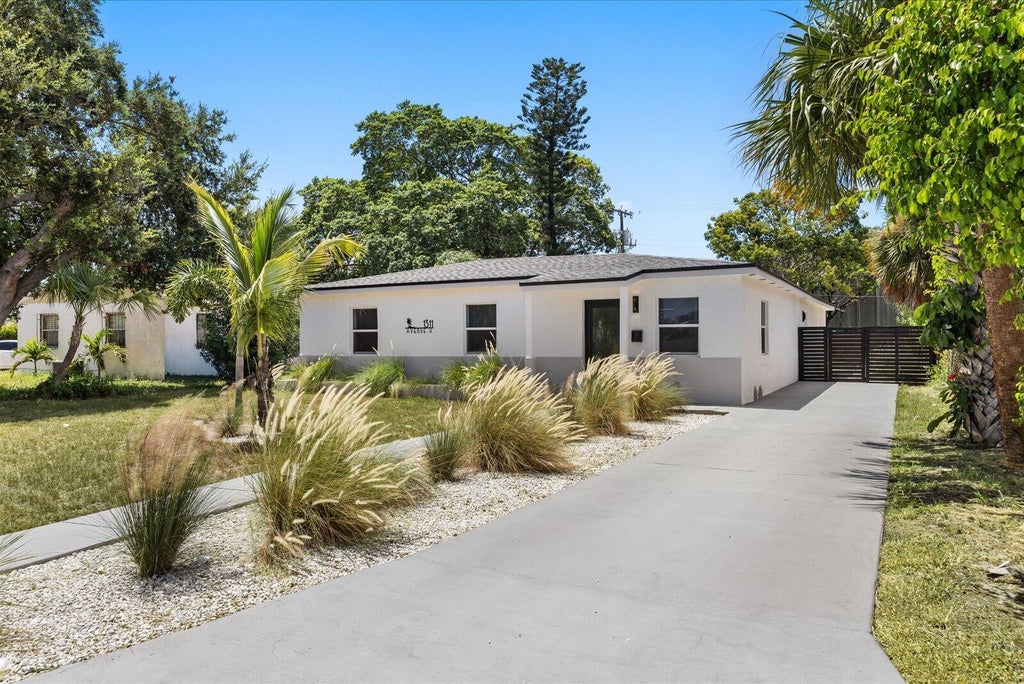 Photo of 1311 AVENUE H, Riviera Beach, FL 33404 (MLS # B26068935)