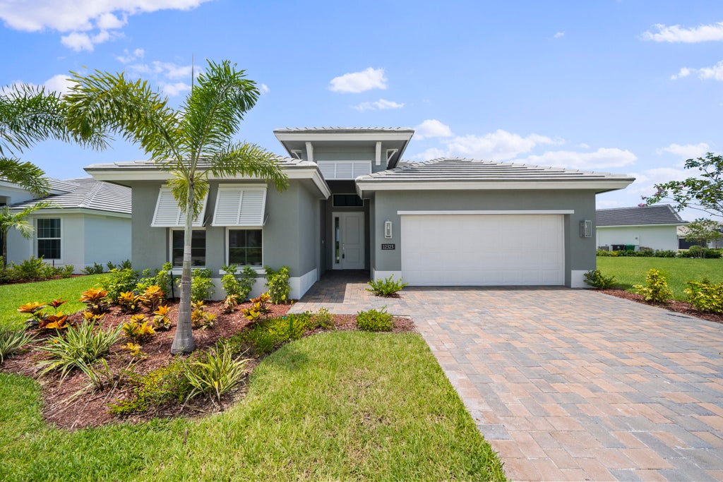 Photo of 12323 SW Sunset Lake Lane, Port Saint Lucie, FL 34987 (MLS # R10877218)