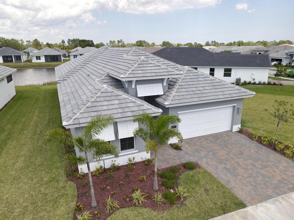 Photo of 12323 SW Sunset Lake Lane, Port Saint Lucie, FL 34987 (MLS # R10877218)
