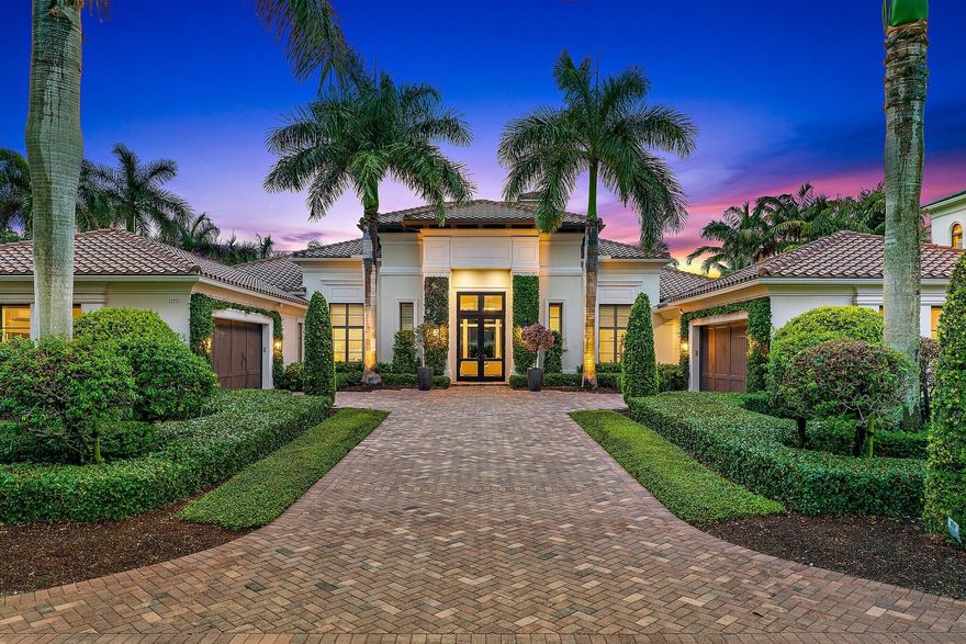 Welcome to 11771 Calleta Court, a luxurious furnished residence situated on a 1/2 acre lot within the desirable Grand Estates of Old Palm Golf Club. This exceptional Bentley Model Home, meticulously crafted by Courchene Dev and interiors beautifully designed by Rogers Design Group, exudes timeless elegance. As you  step through the exquisite grand mahogany front door w/glass panels and transom window, you are greeted by the breathtaking beauty of this home. The stunning honed marble floors throughout create a seamless flow, enhancing the sense of sophistication.  Every detail of this residence has been thoughtfully curated to ensure the utmost in quality and luxury. Custom chrome wine closets, a gourmet kitchen with Opustone quartzite countertops and Irpinia Cabinetry grace the kitchen, bar and butler's pantry while Thermador appliances elevate the culinary experience. Indoor and outdoor natural gas fireplaces, including the Lennox linear fireplace with marble surround, add warmth and ambiance to both the interior and the outdoor spaces. The generous primary bedroom offers European white oak floors, his and her baths, closets and a comfortable sitting area that opens up to your own private oasis. Here, you'll discover a heated pool, spa, and captivating water feature, allowing for ultimate relaxation and tranquility. Exquisite custom ceiling treatments and Andersen windows further enhance the overall elegance of this home. Outside, you'll find light travertine pavers and a covered patio adorned with honed marble tiles, a summer kitchen with a large dining table perfectly positioned for al fresco dining while enjoying the serene surroundings. No expense has been spared when it comes to functionality and convenience. Her dressing room, spanning an impressive 15x11, provides ample hanging space, shelves, and built-in cabinetry. The residence also features two, air conditioned 2car garages with epoxy flooring, a whole-house generator, a spacious laundry room with abundant cabinetry, a utility closet, and additional storage option.
Other features include volume ceilings ranging 10' to 15' feet with extraordinary ceiling treatments. Barrel ceiling with cove lighting in her master bathroom. Impressive bulit-ins, in the family room, office and fitness room. Remarkable millwork throughout, Plantation shutters, Tongue and groove ceilings at the foyer and loggia. Artificial turf in the back yard provides a maintenance and chemical free environment for family and pets. A very short distance to walk your dog with golf path that lead to the 18th hole and clubhouse. 
Mandatory membership grants access to a beach membership at the Palm Beach Hilton on Singer Island, just minutes away from Juno Beach, Worth Avenue, Palm Beach International Airport, North County Airport, the Kravis Center, and the Maltz Theatre. The surrounding PGA corridor and Jupiter are renowned for their popular restaurants, ensuring a wealth of dining options for residents to indulge in.
Offered recently beautifully furnished, 11771 Calleta Court is an extraordinary residence that combines timeless elegance, exceptional craftsmanship, and a desirable location, making it a true haven of luxury living in the heart of the Palm Beaches. 
Gated and lushly landscaped, the property is surrounded by mature foliage. 24 hour manned security. This home has been meticulously maintained and not one to miss! 
Old Palm Golf Club, boasting a newly renovated Raymond Floyd designed course, offers an exclusive experience with no tee times required. Golf enthusiasts will also appreciate the separate 33-acre, 3-hole practice studio equipped with Trackman V-1 swing analysis, making it a haven for avid golfers and beginners alike. The clubhouse, currently undergoing renovations (Completion Dec 2023) has fine dining, a café, a lounge, men's and women's spas, a fitness center, a pool with cabanas, and one-bedroom casitas available for extra guests.