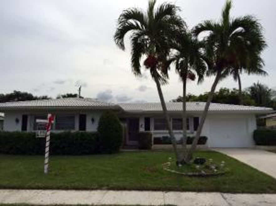 Beautifully maintained home in one of East Boca's most desirable neighborhoods. Newer tile roof, newer A/C, large screened patio with wood beam ceiling. Interior laundry, &'1 car garage. Large Florida room could be a 3rd bedroom. Large yard with room for a pool. A rated schools & minutes to the beaches, shops, restaurants & all of Boca's amenities.