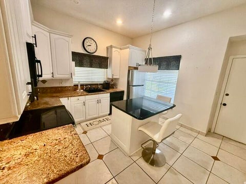 Tiny photo for 10320 NW 11TH Street, Plantation, FL 33322 (MLS # B26083011)