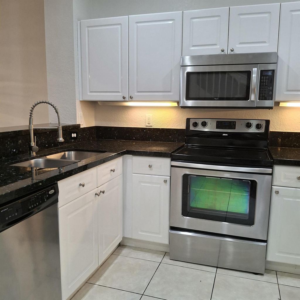 Photo of 9498 S Military Trail #6, Boynton Beach, FL 33436 (MLS # R11118037)