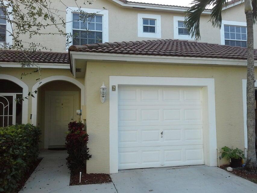 This quaint community is centrally located in Boynton and close to shopping, restaurants and the beach. The YMCA is right down the street and is walkable. DEN CAN BE USED AS A 3RD BEDROOM AS IT DOES HAVE A CLOSET. Two story, one car garage townhome with a patio that overlooks the canal. Brand new luxury vinyl planks on the second floor. No carpet here. Kitchen has granite and stainless-steel appliances. Call for a showing today!!