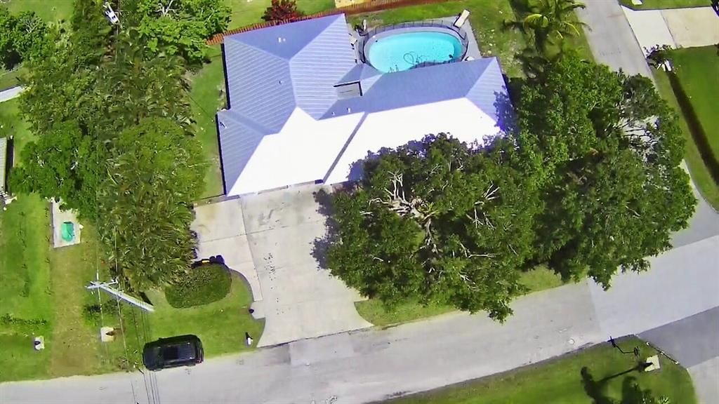 Photo of 3051 SW Earl Avenue, Palm City, FL 34990 (MLS # R10884420)