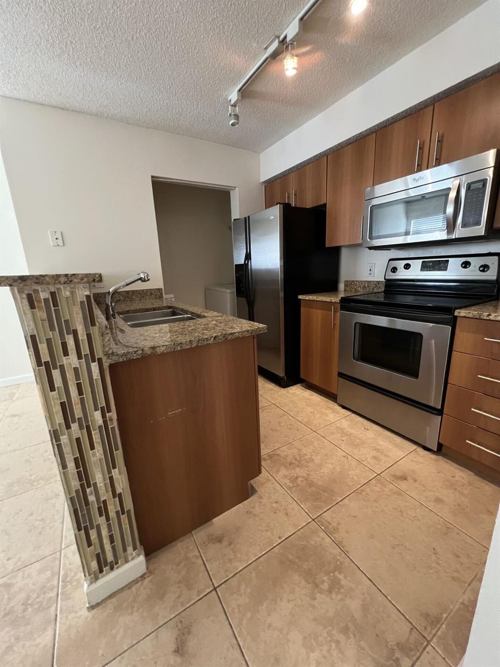 Photo of 1215 Crystal Way #C, Delray Beach, FL 33444 (MLS # R10972290)