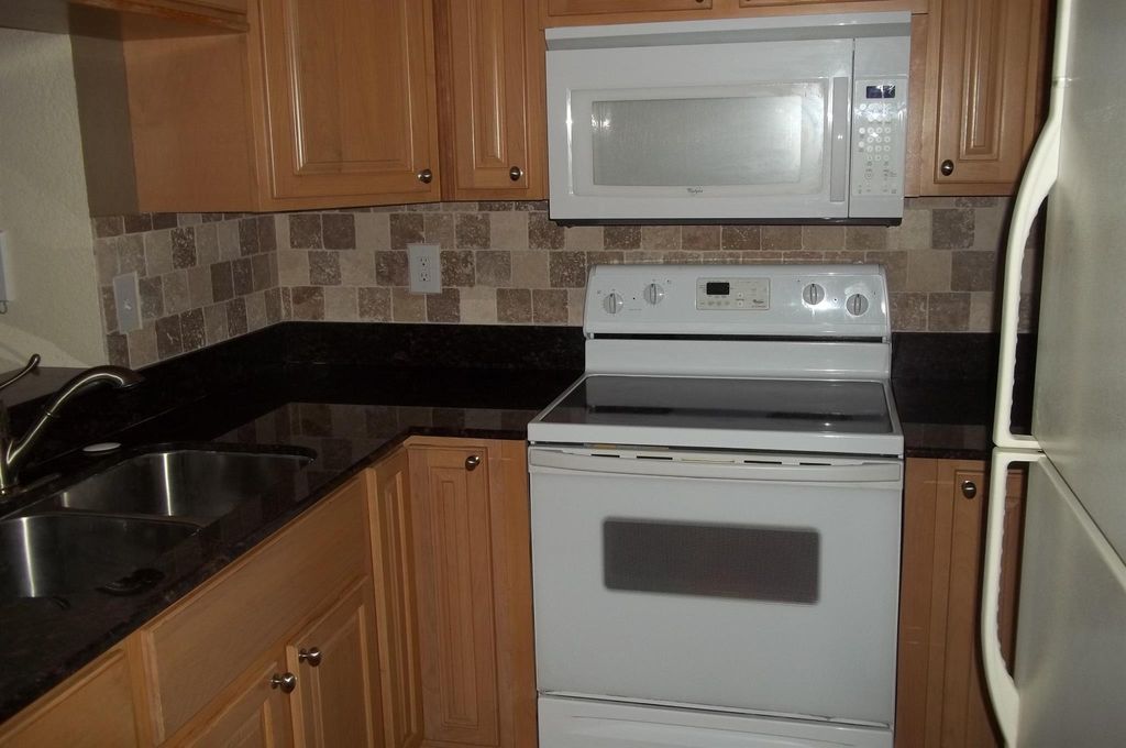 Photo of 1504 SE Royal Green Circle #C-201, Port Saint Lucie, FL 34952 (MLS # R11095724)