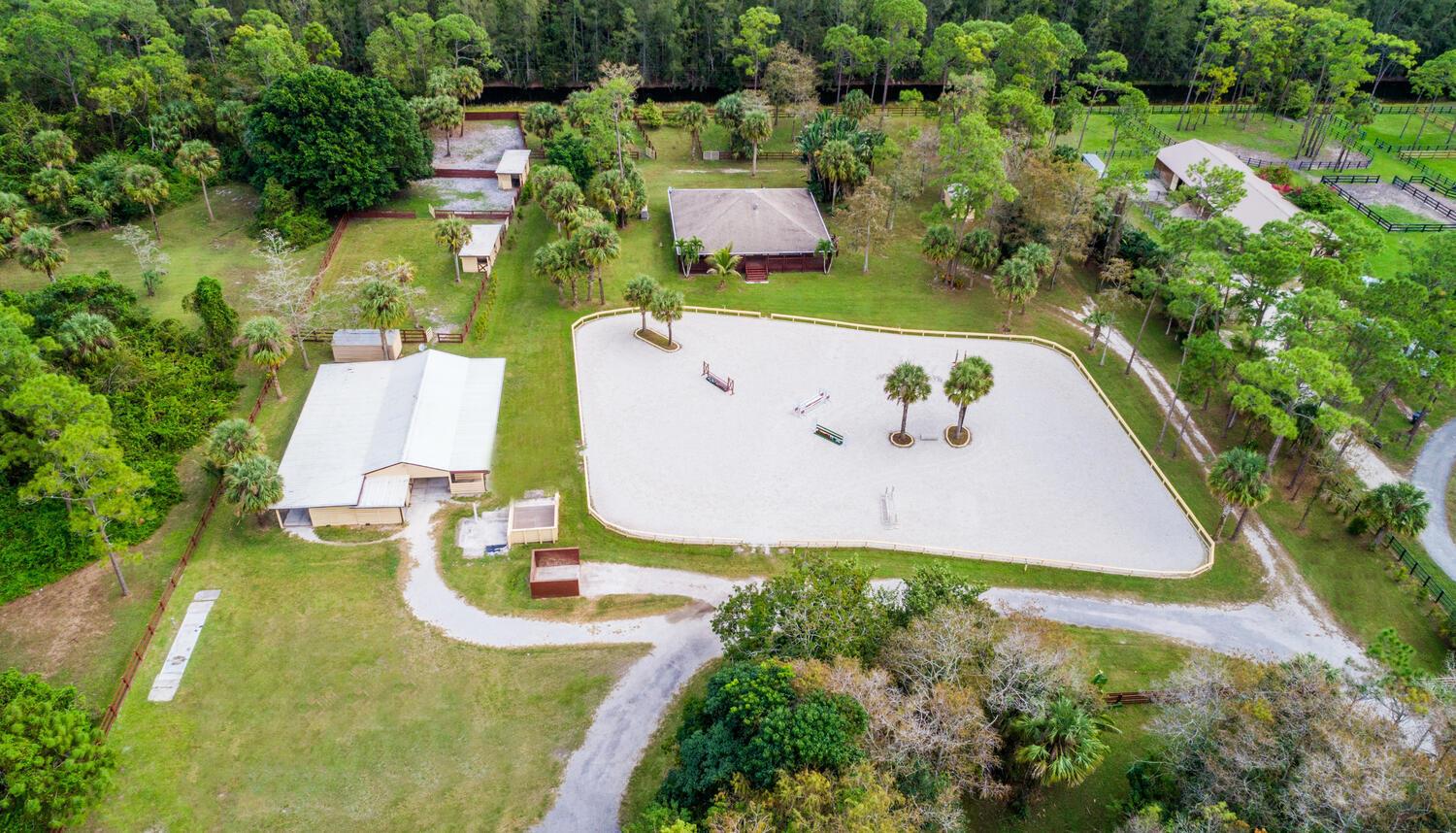 Lovely 5 acre farm in Deer Run is open and ready for horses to move in for the 2025/2026 Season. Enjoy the quiet serenity of Deer Run, just 10 minutes outside of Wellington. *Main house is not available* Features of this farm include a laundry/ tack room, bathroom, 14 spacious stalls, 2 wash racks, 3 extra grooming stalls, and 7 large paddocks. The property is located in a gated neighborhood with a large system of bridle paths and horse trails. List price is per stall for season, stalls are also available annually, please inquire if interested.