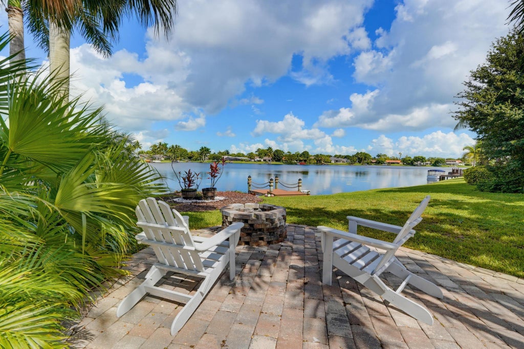 Photo of 1619 Wiltshire Village Drive, Wellington, FL 33414 (MLS # B26045230)