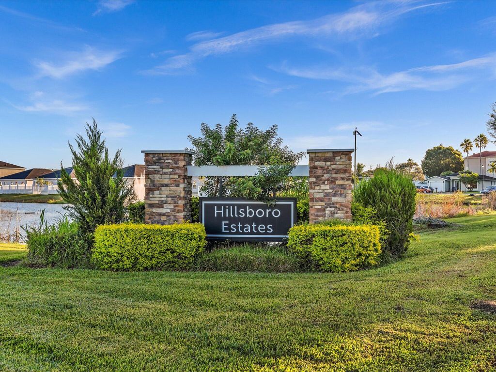 Photo of 122 Dabou Loop, Belle Glade, FL 33430 (MLS # R11131628)