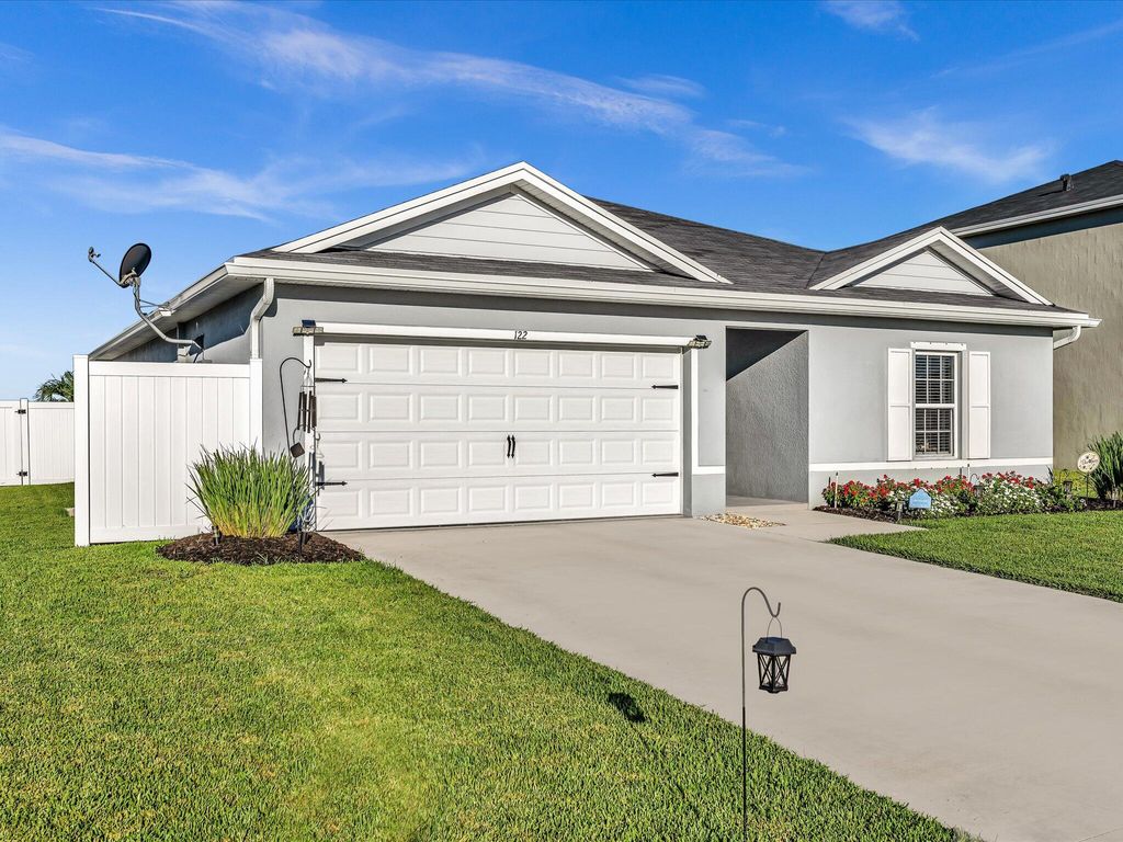 Photo of 122 Dabou Loop, Belle Glade, FL 33430 (MLS # R11131628)