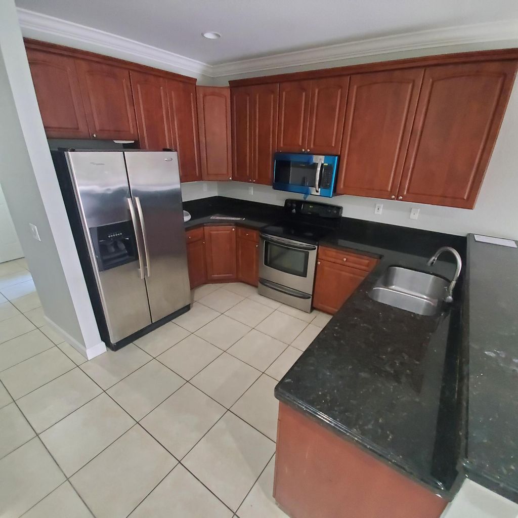 Photo of 115 Akron Street #C, Lake Worth Beach, FL 33461 (MLS # B26019691)