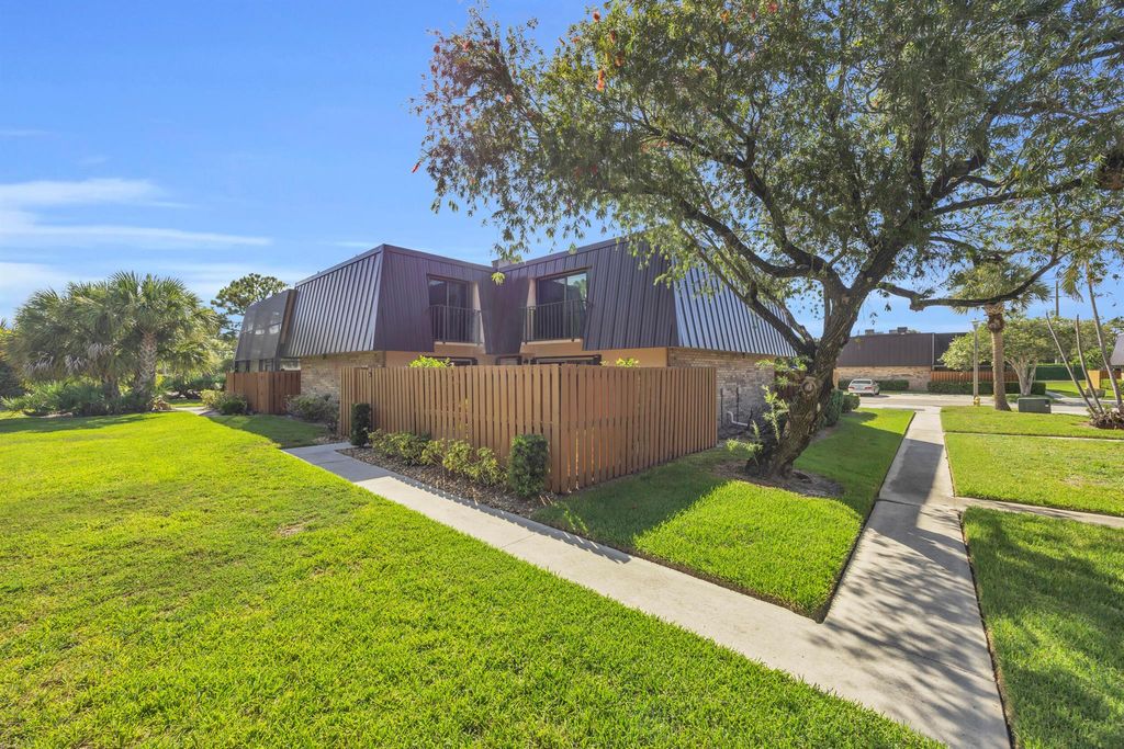 Photo of 5693 SE Windsong Lane #545, Stuart, FL 34997 (MLS # R11102991)