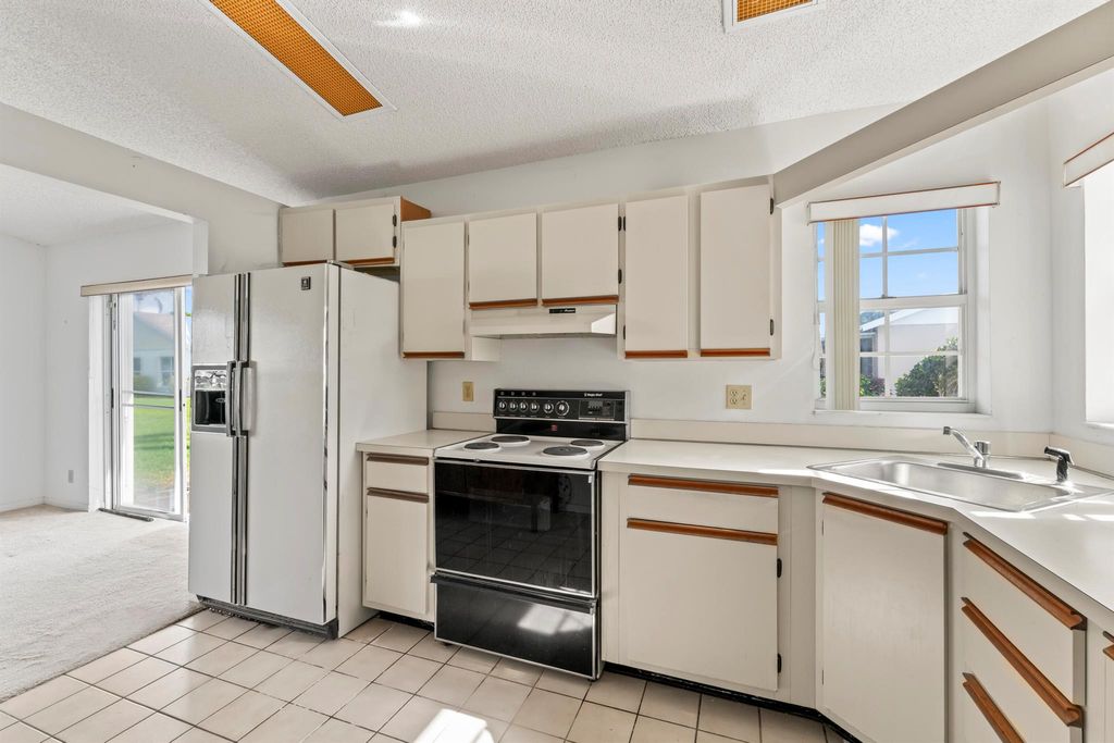 Photo of 1261 Pine Sage Circle, West Palm Beach, FL 33409 (MLS # R11149301)