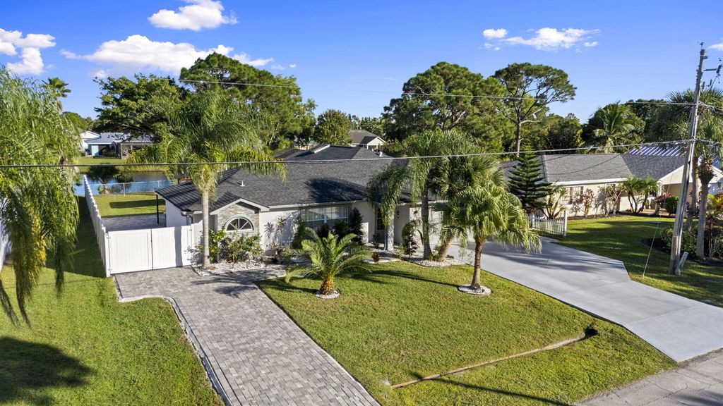 Photo of 2471 SE Leithgow Street, Port Saint Lucie, FL 34952 (MLS # B26024394)