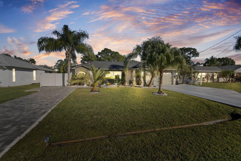 Photo of 2471 SE Leithgow Street, Port Saint Lucie, FL 34952 (MLS # B26024394)