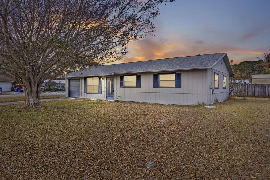 Located in the heart of Palm City near the established Martin Downs area, this 3BR/2BA home sits on a desirable corner lot with no HOA--bring your boat or RV. Featuring a newer roof (2022) and recently connected city water with permits, it offers peace of mind and lasting value. The comfortable interior is ready for your personal touches. Enjoy quick access to I-95 and the Turnpike, just 5 minutes to shopping, 12 minutes to downtown Stuart, 20 minutes to beaches, and minutes from golf courses and popular fishing spots. Nearby streets feature regular pedestrian activity, with runners, shoppers, and access to cafes, food spots, small shops, salons, a paint store, and an animal medical center within about 0.75 miles. Your Palm City story starts here!