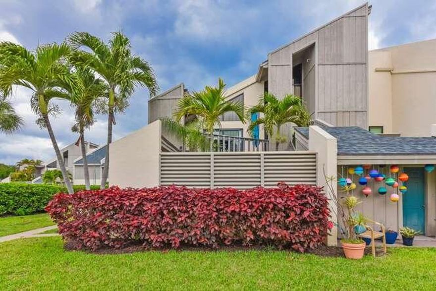 Welcome to this beautifully updated corner-unit townhouse in the heart of East Jupiter. This turn-key two-bedroom, two-bathroom residence features an updated kitchen with stainless steel appliances, including an upscale Miele refrigerator, along with an in-unit Miele washer and dryer. Remodeled bathrooms and carpet-free flooring complement the light and bright interiors. Hurricane impact glass provides peace of mind, while multiple patios create ideal spaces for entertaining. Steps from Jupiter Beach and minutes from Carlin Park and DuBois Park, this location delivers the coveted coastal lifestyle you deserve. Furnished with modern finishes and effortless charm, this home is ready for immediate enjoyment. Schedule your private tour today.
