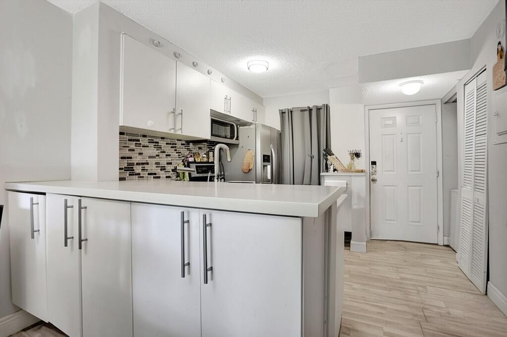 Photo of 2216 N Cypress Bend Drive #501, Pompano Beach, FL 33069 (MLS # R11157095)