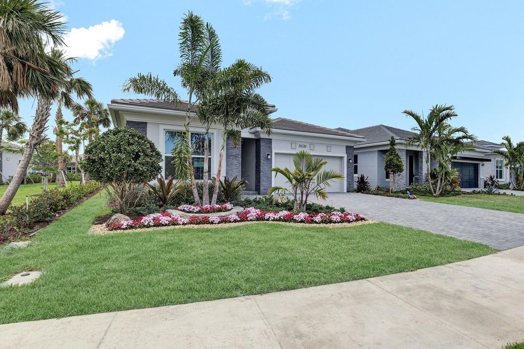 Photo of 10130 Driftwood Way, Palm Beach Gardens, FL 33412 (MLS # R11081012)