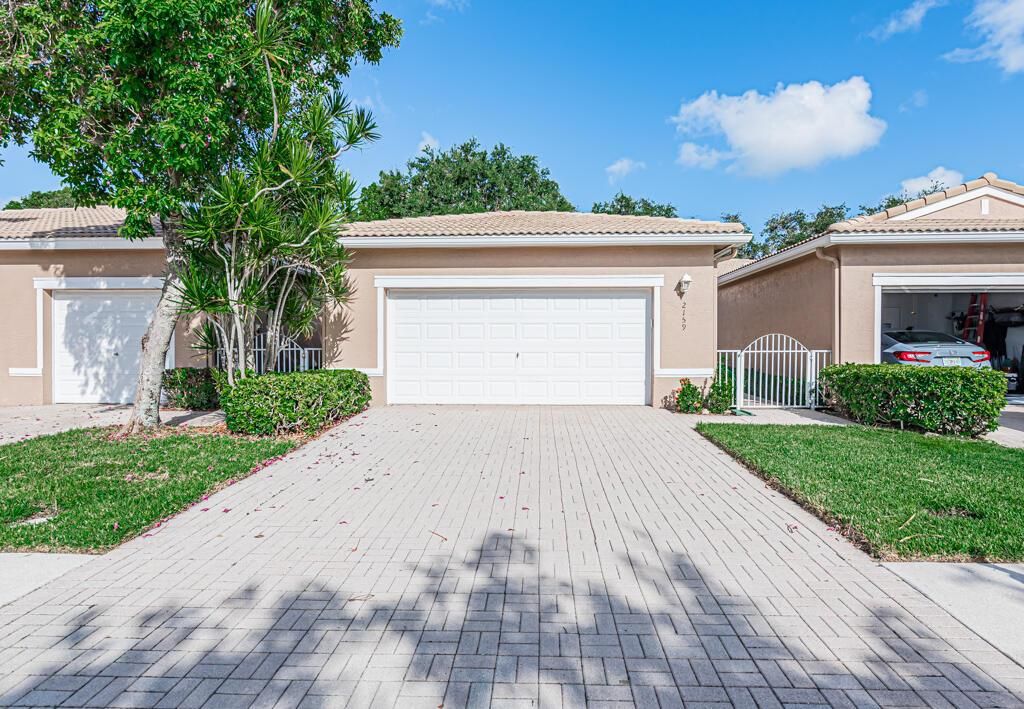 Photo of 2159 Man Of War, West Palm Beach, FL 33411 (MLS # R10822685)