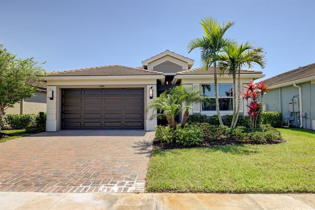 Photo of 11086 SW Carriage Hill Lane, Port Saint Lucie, FL 34987 (MLS # R10787297)